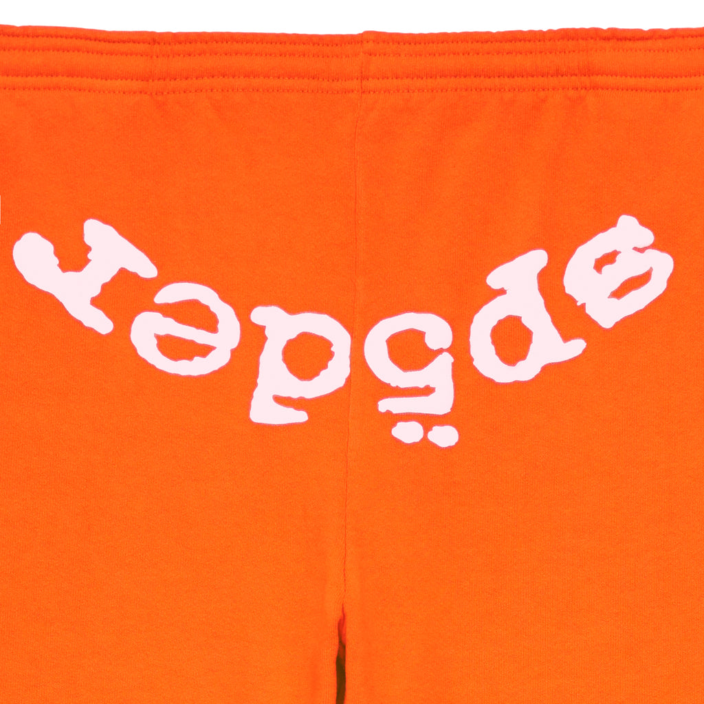Orange Legacy Sweatpants with white "SP5DER" puff print text.