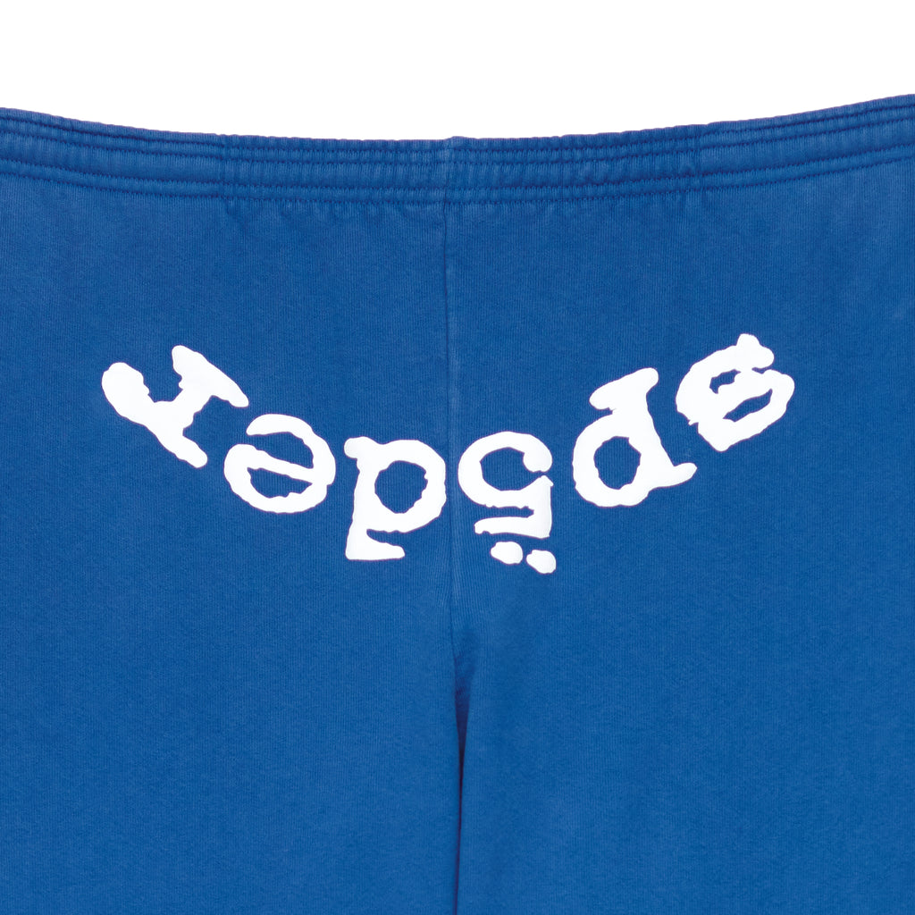 Blue LEGACY SWEATPANT with white puff print "Sp5der" text on the back waistband.