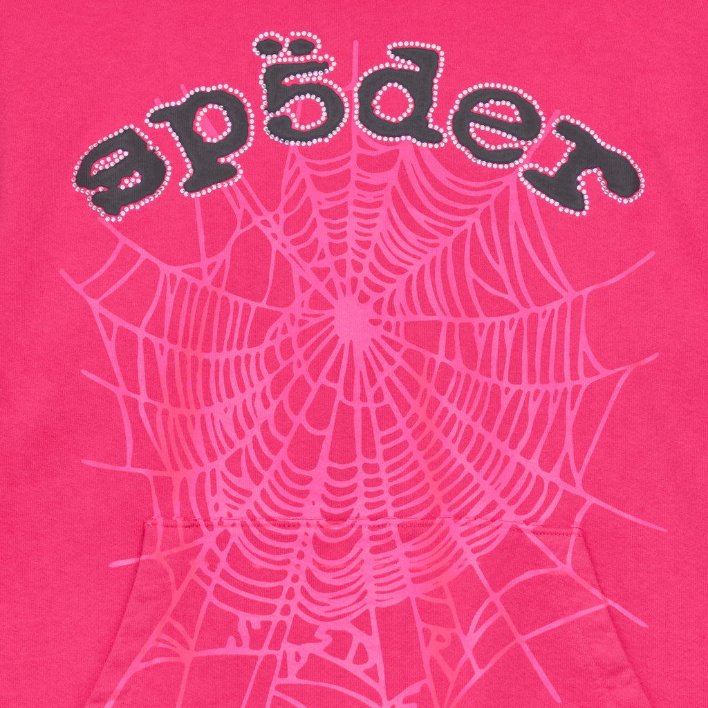 Pink LEGACY HOODIE with black "SP5DER" puff print, rhinestone applique, and a large pink web graphic.