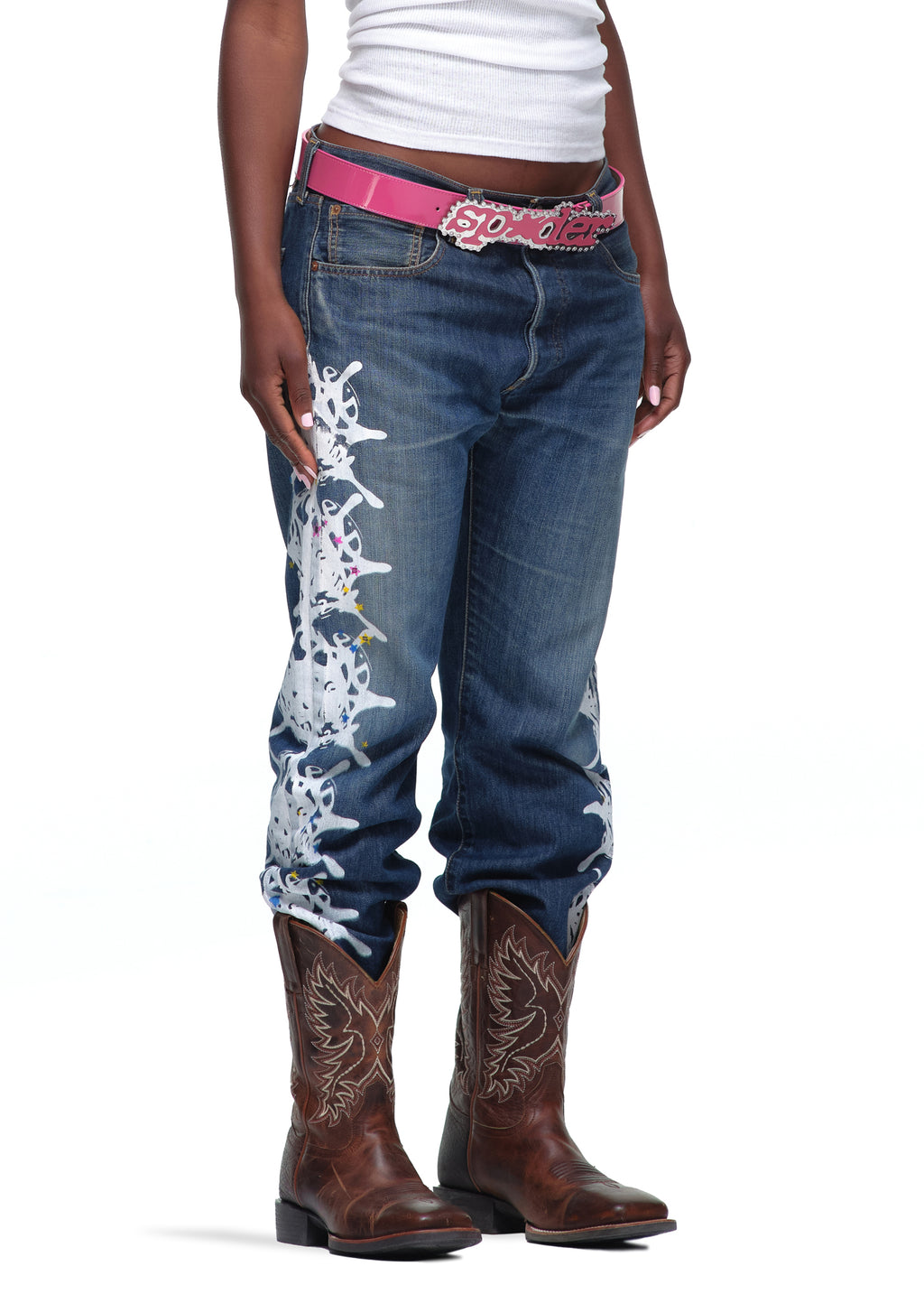 P*NK V2 BELT: Pink patent leather belt with rhinestones, stud fastening, and SP5DER text buckle.