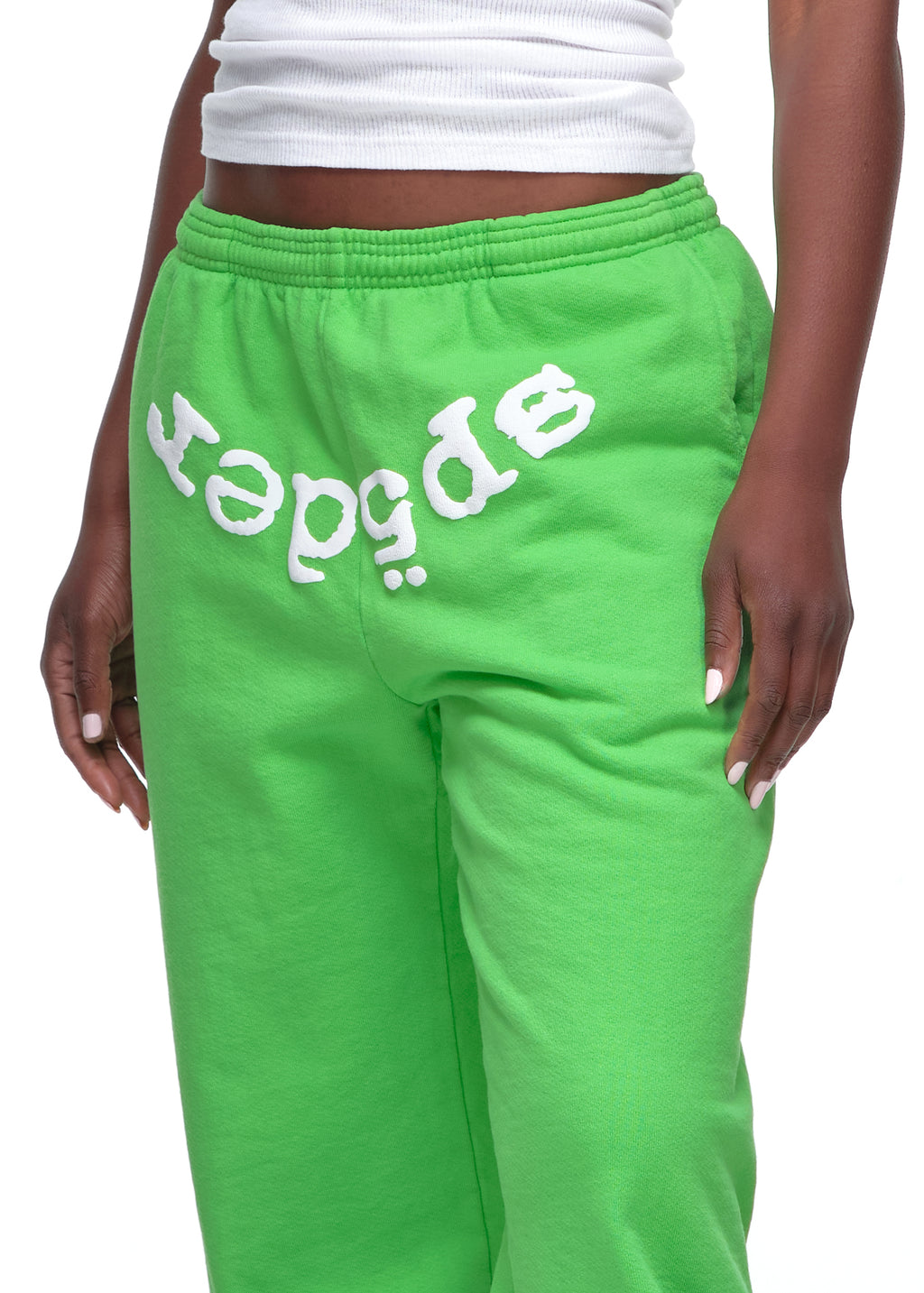 Lime green fleece sweatpants with white puff print "SP5DER" text on the front.