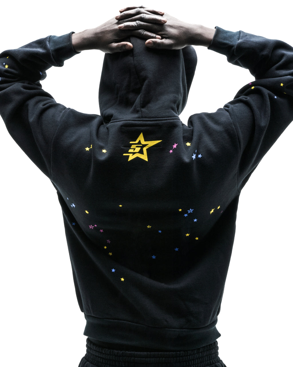 Black PUNK V2 zip-up hoodie, 13oz cotton fleece, with yellow star logo and scattered colorful stars.