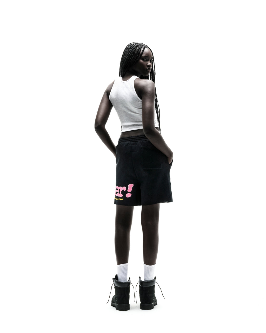 Black PUNK V2 SWEATSHORT with pink P*NK SP5DER text and scattered stars, worn by a model.