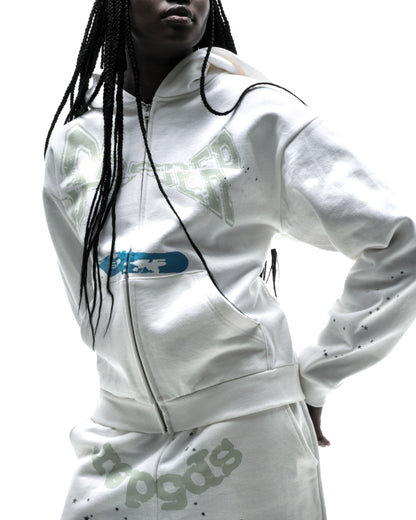 Model in white 13oz cotton fleece T&F zip-up hoodie with puff print and scattered stars.
