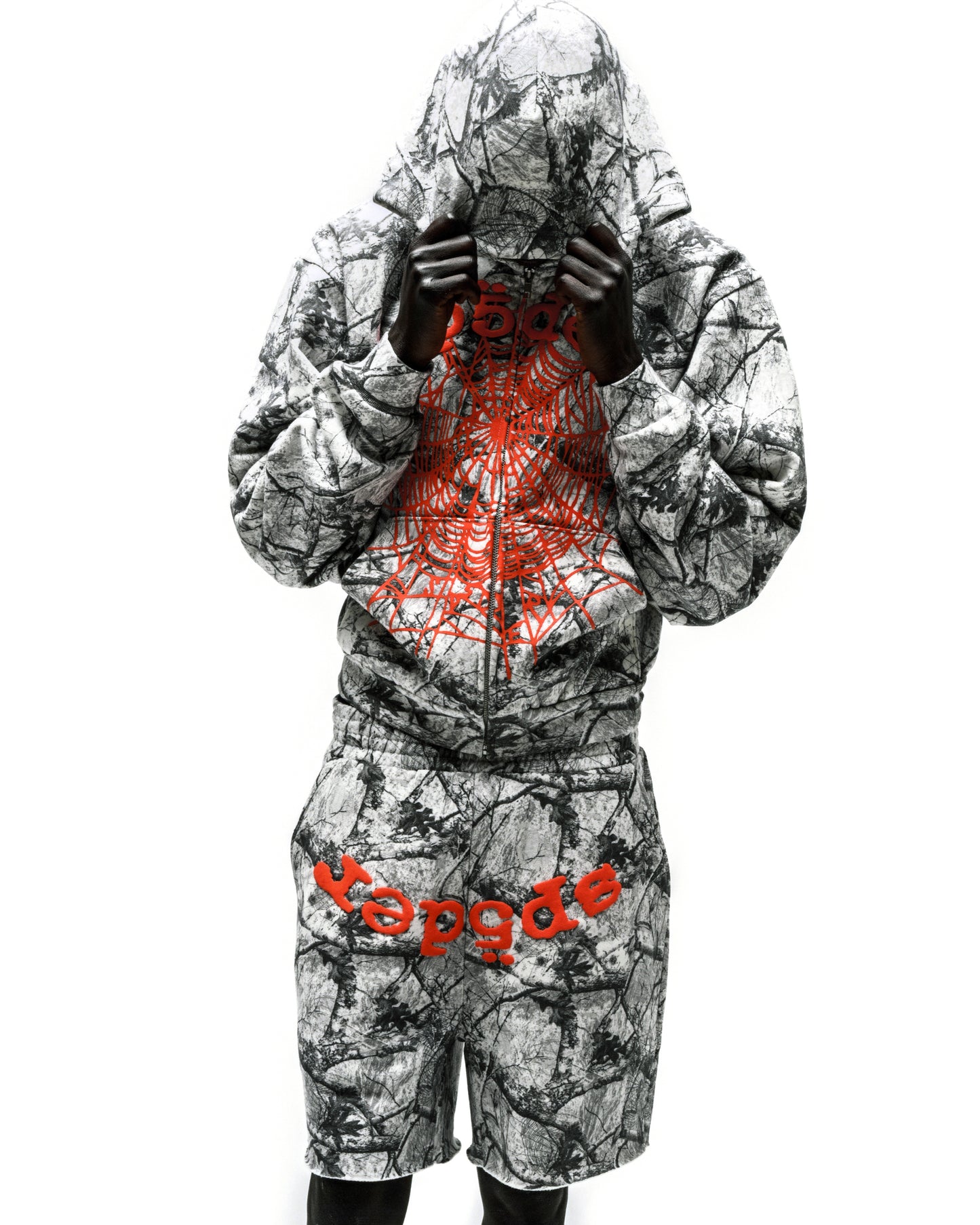 REALTREE OG WEB V2 zip hoodie and shorts set with red puff print spiderweb and "Vapgde" text.