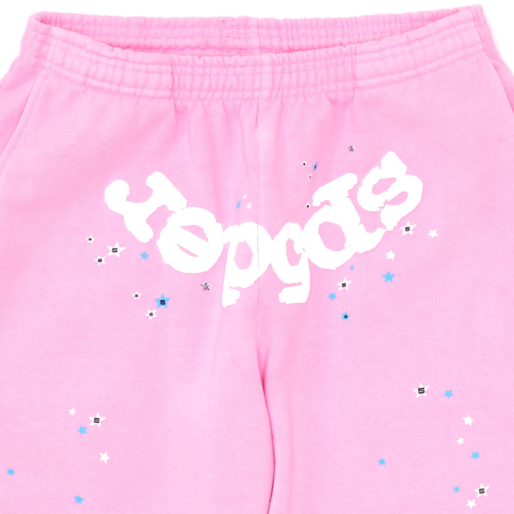 OG WEB PINK SWEATPANT with white puff print "Sp5der" text, scattered stars, and "S" logos.