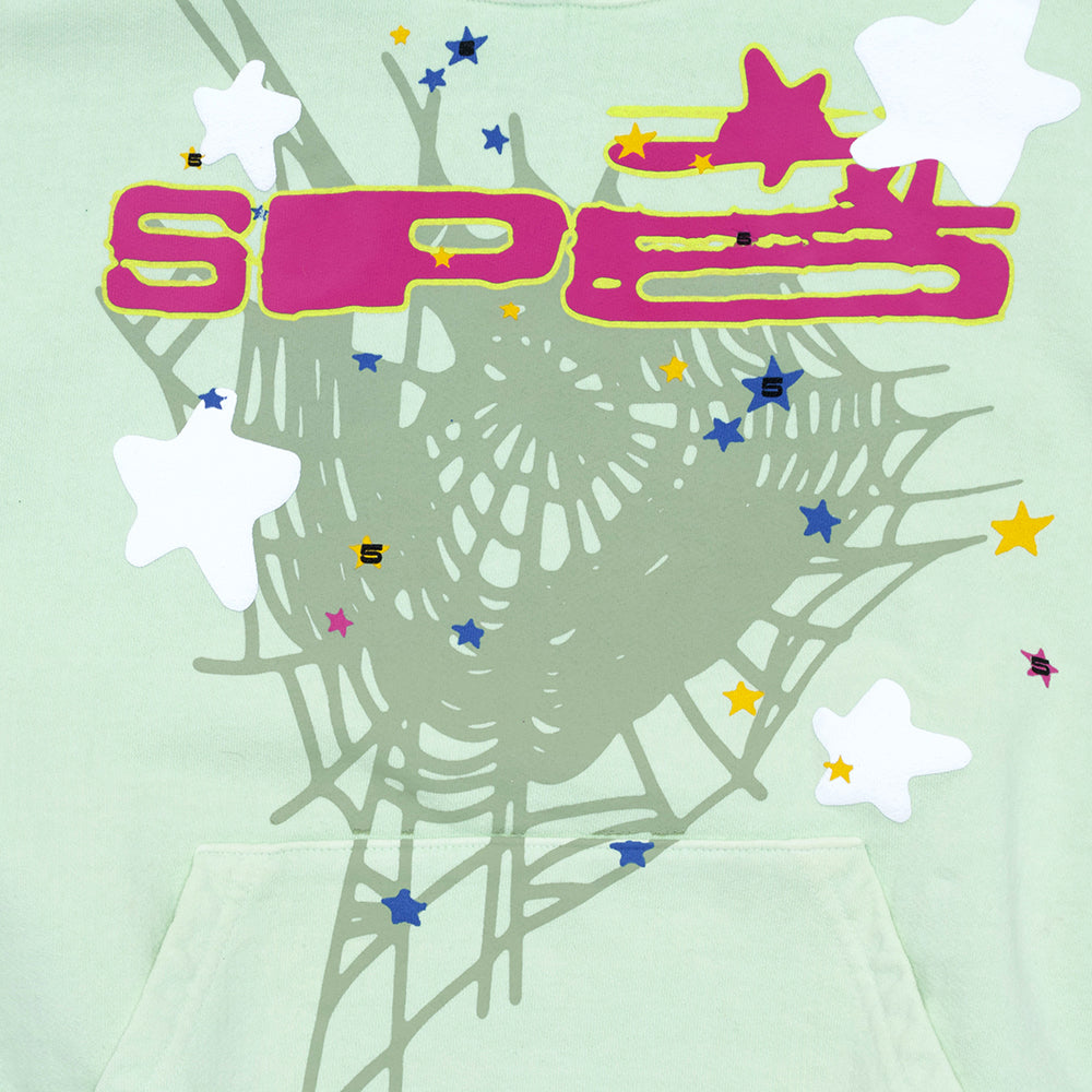 Mint green fleece hoodie with pink SP5 puff print, web design, and scattered star graphics.