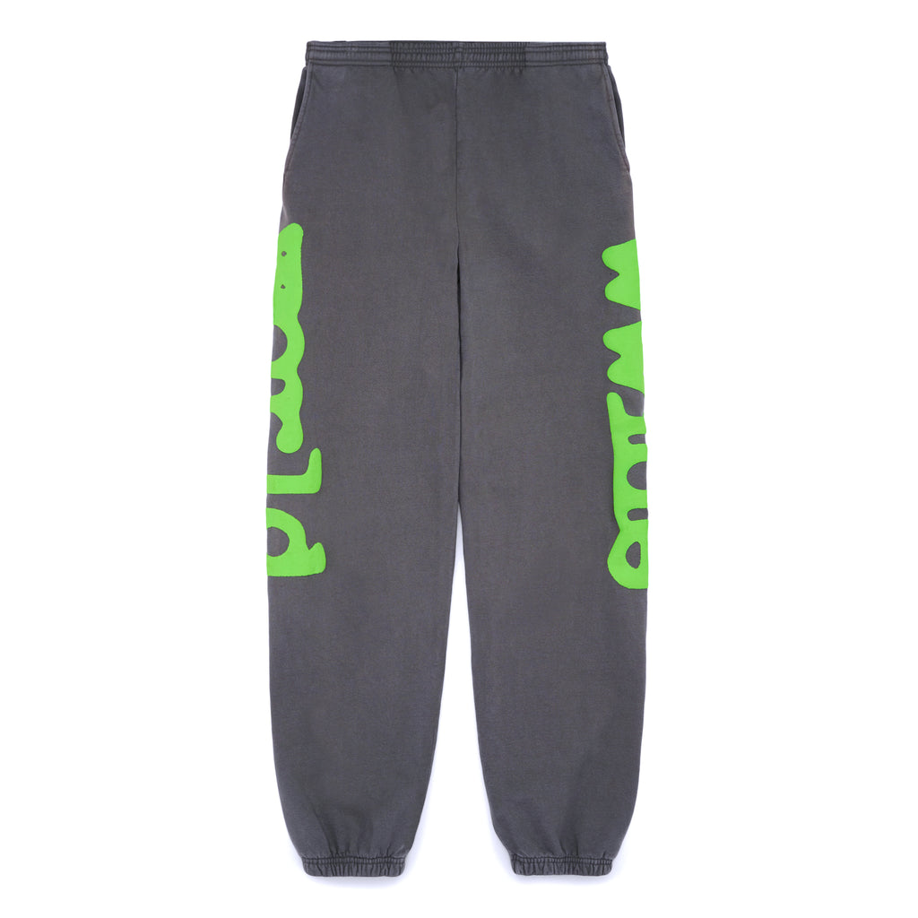 Slate grey Beluga sweatpants with bright green "Worldwide" puff print down both legs.