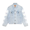 Light wash vintage Levi's denim trucker jacket with white contrast web and colorful stars on sleeves.