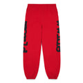 Red Beluga sweatpants with black 'Worldwide' puff and discharge print down both legs.