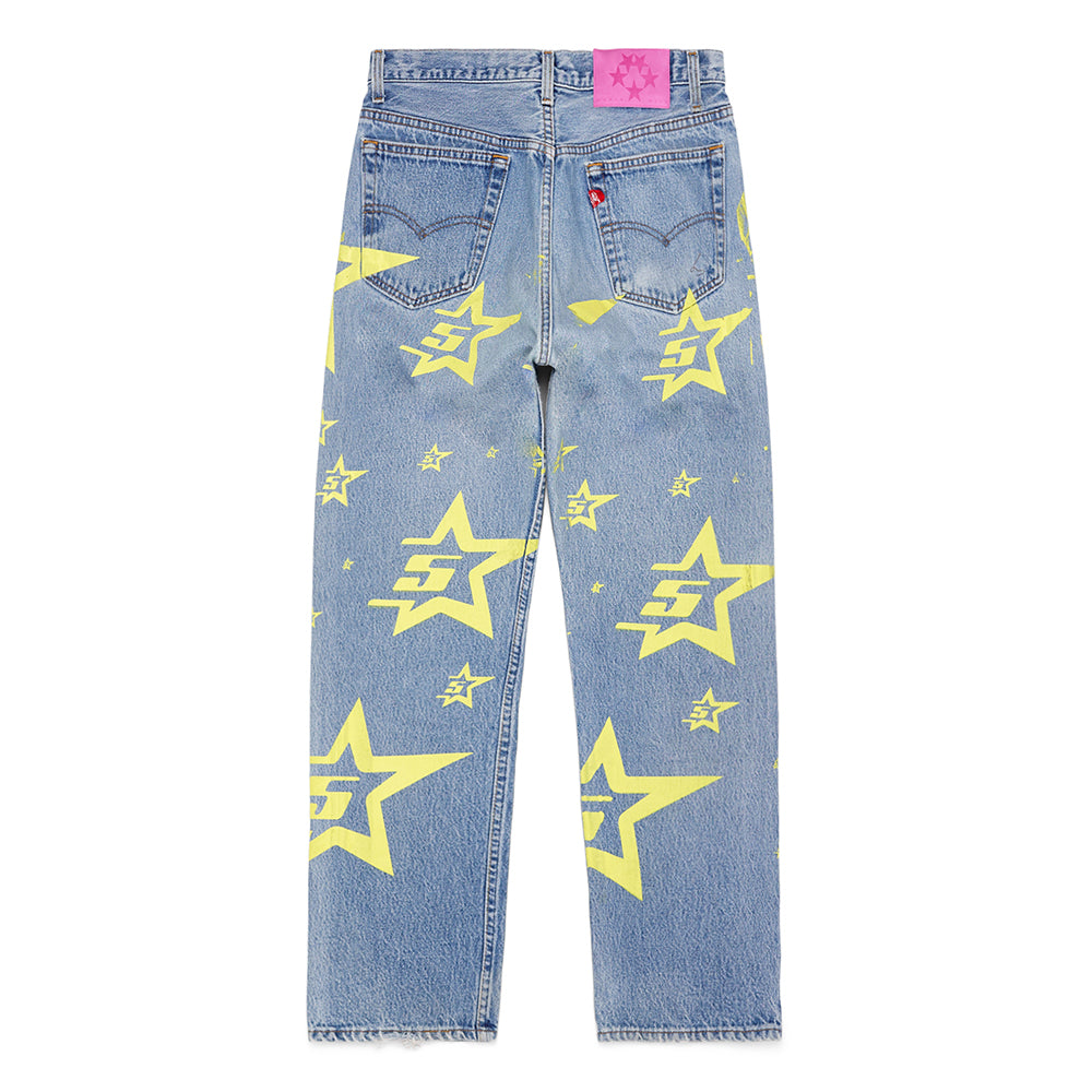 Vintage Levi's 501 denim with yellow 5STAR print and a pink SP5DER branded leather back tab.