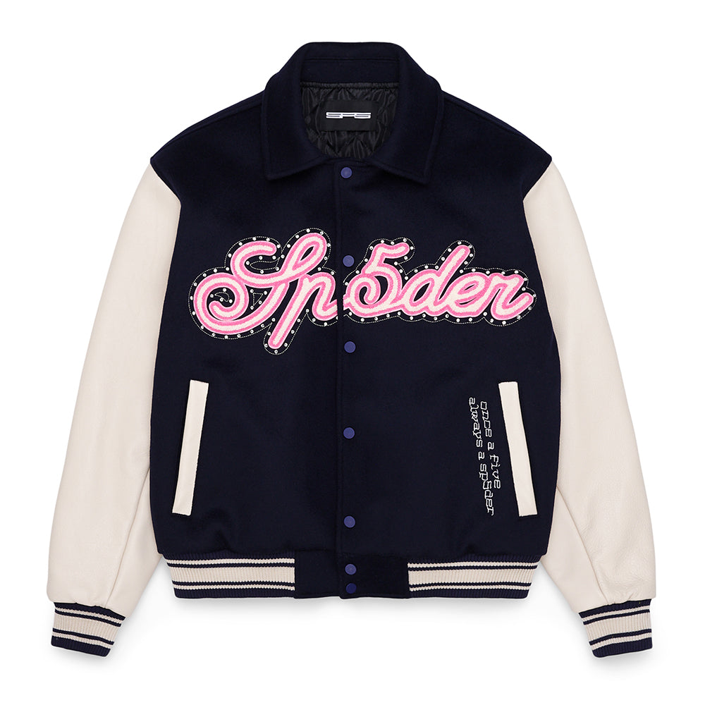Navy wool varsity jacket with cream cowhide sleeves, pink chenille "Sp5der" patch, and striped cuffs.