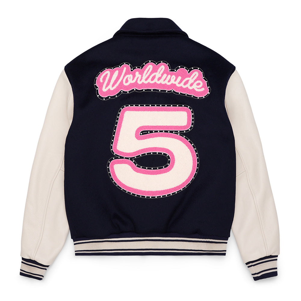 Navy wool varsity jacket with cream cowhide sleeves, pink "Worldwide" patch, and large pink "5" on the back.
