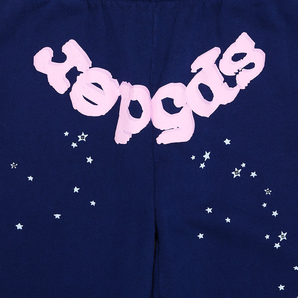 Navy OG WEB SWEATPANT with pink puff print "Sp5der" text and scattered white star print.