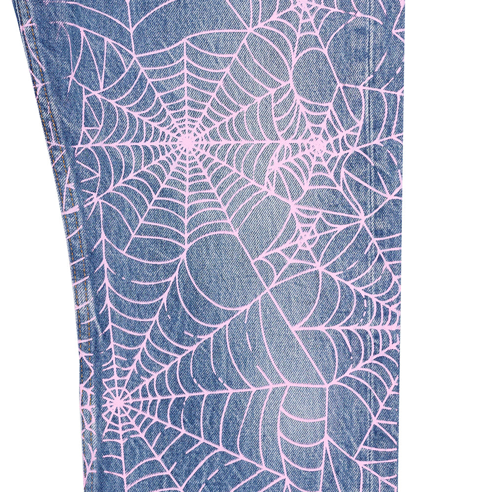 Vintage Levi's 501 denim with all-over pink spider web print.