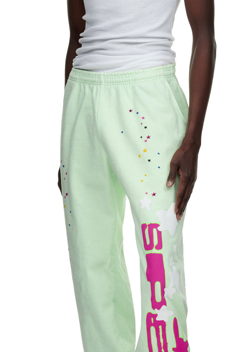 SP5 Mint Sweatpant, light green fleece with pink SP5 text and colorful star print.