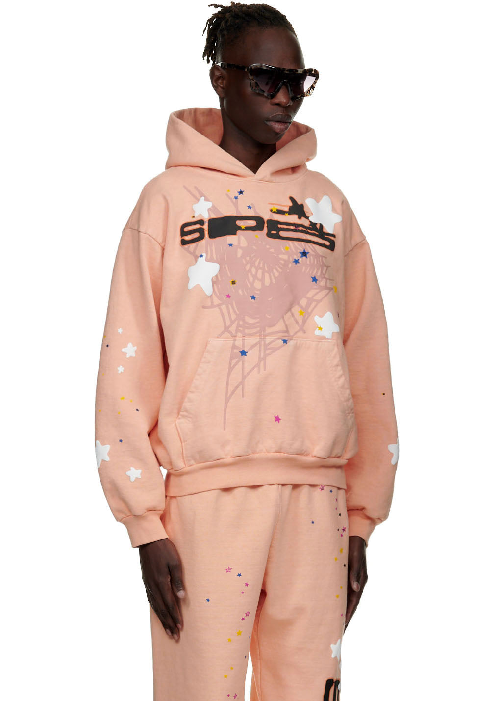 Bellini pink 23oz fleece hoodie with puff print SP5 text, web, and star graphics.