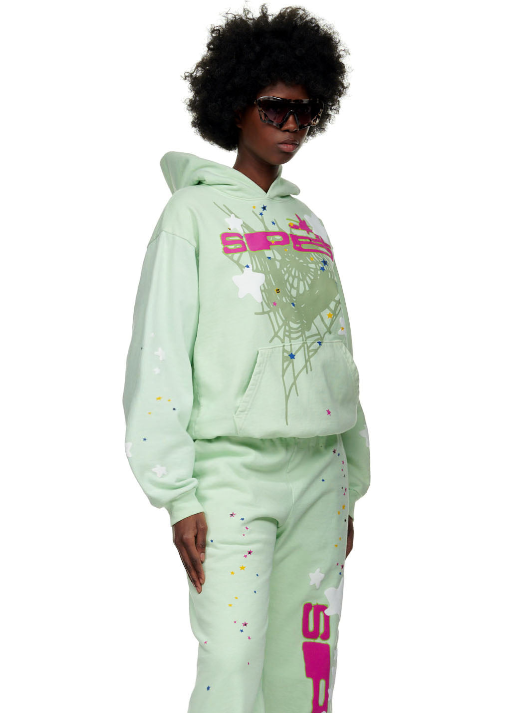 Mint green SP5 hoodie and sweatpants with puff print "SP5" text, web, and star graphics.