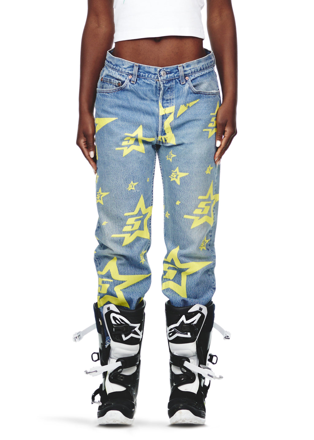 Vintage Levi's 501 denim jeans with yellow 5STAR print and a leather SP5DER back tab.