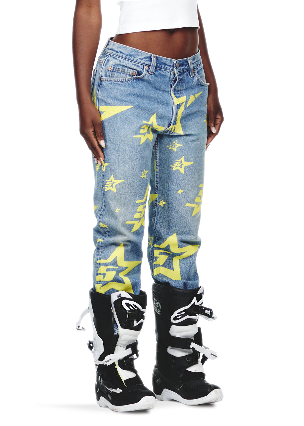 Vintage Levi's 501 denim jeans with yellow 5STAR print and SP5DER branded back tab.