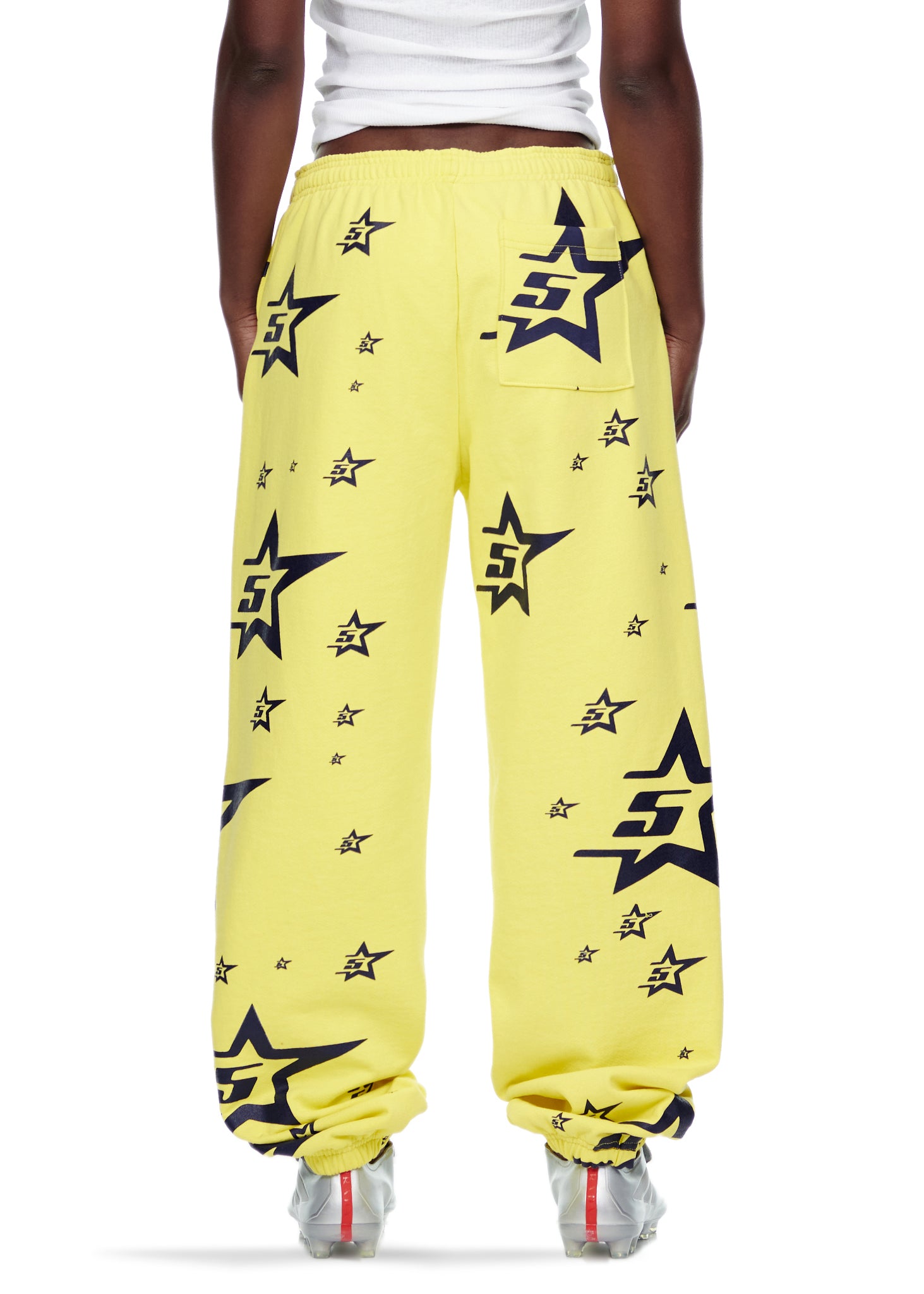 Yellow 5STAR SWEATPANT with all-over black star print, made from 23oz fleece.