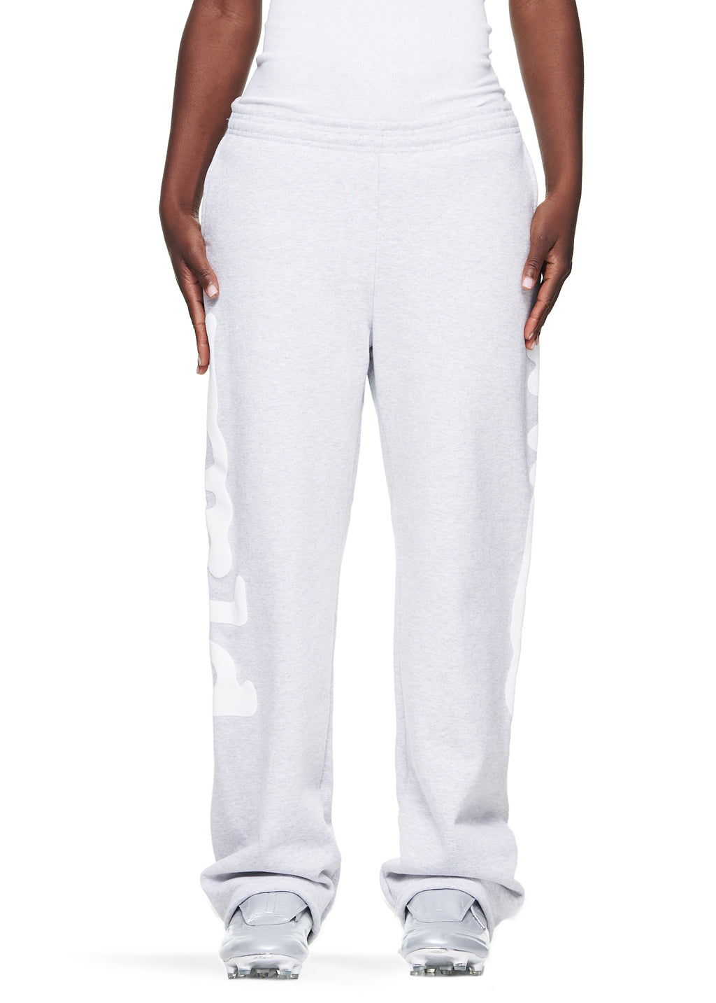 Women's light grey straight leg fleece sweatpants with "Worldwide" puff print down both legs.