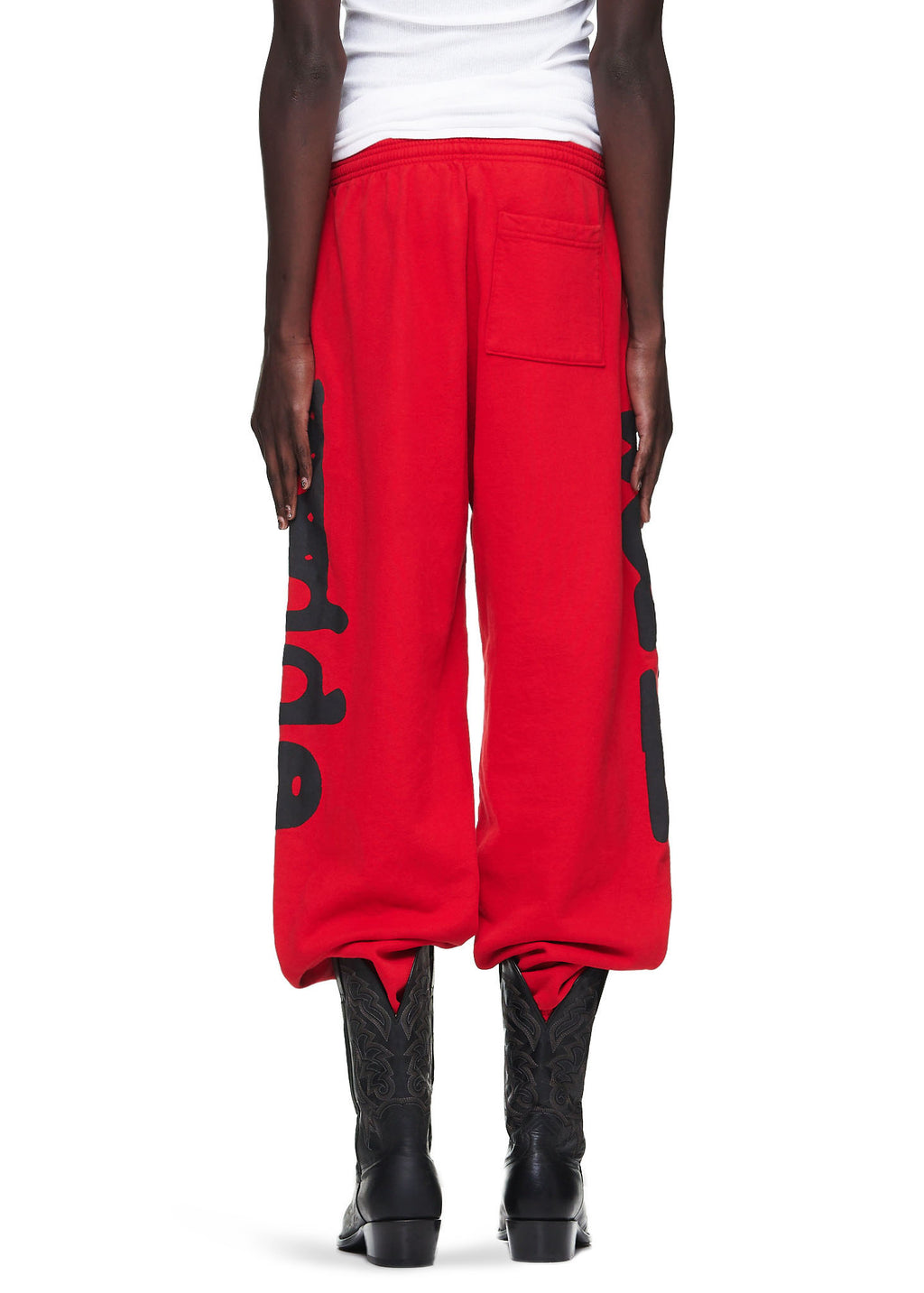 Red Beluga sweatpants with black "Worldwide" puff print, worn by a male model in size L.