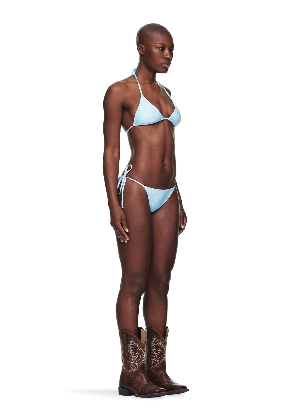 Blue Five Star bikini set with rope ties and cowboy boots on a model.
