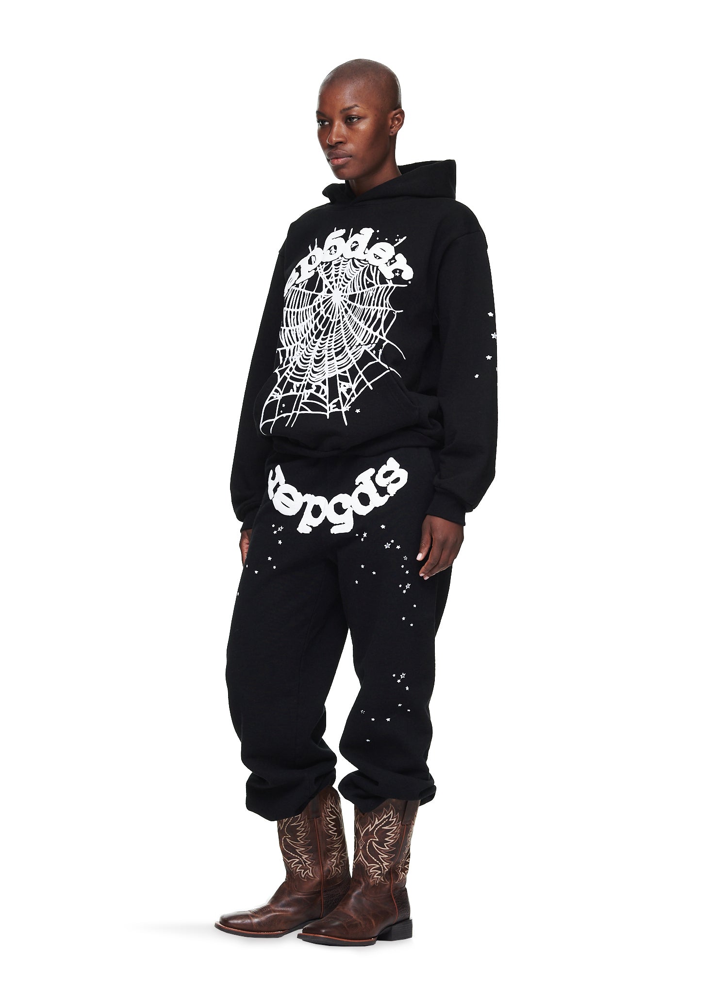 Black OG Web Hoodie and sweatpants with white puff print spider web and text, worn by a model.