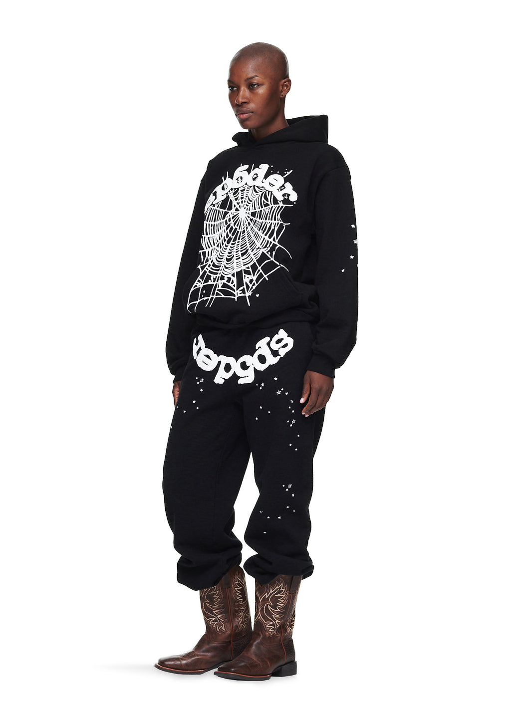 Black OG Web Hoodie and sweatpants with white puff print spider web and text, worn by a model.
