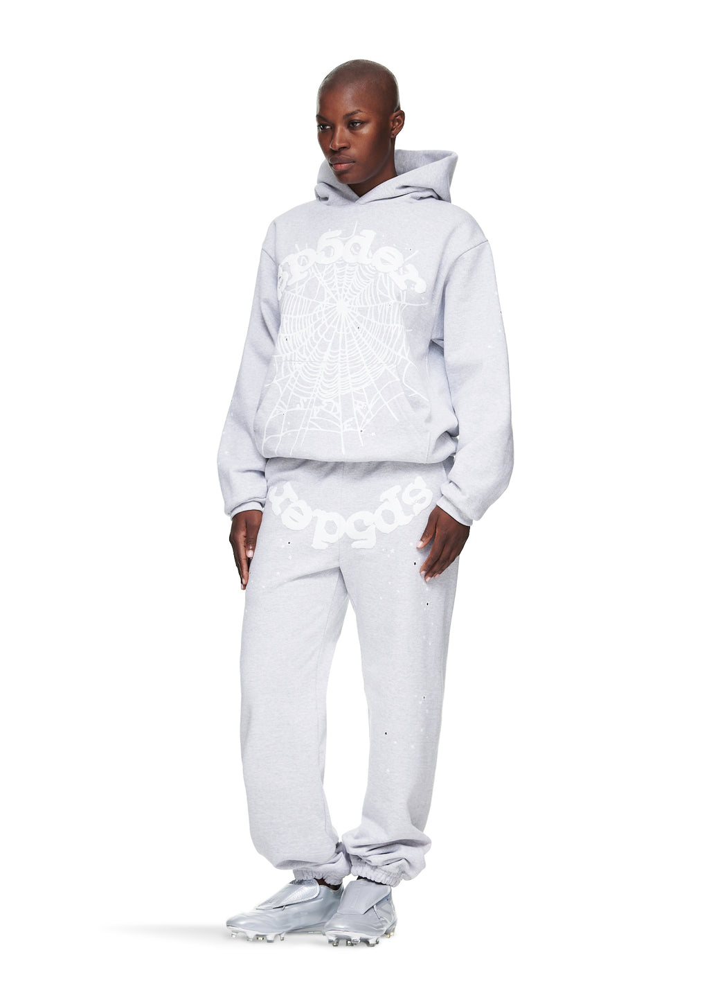 Heather grey OG Web Hoodie and sweatpants with white puff print, worn by a model.