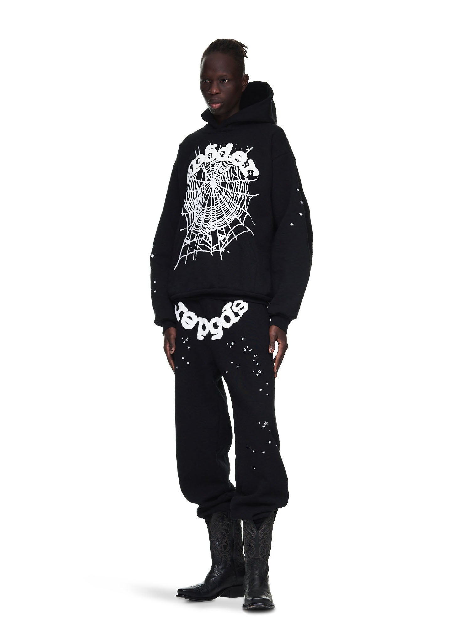 Black OG Web Sweatpant with white puff/discharge print, spiderweb graphic, and scattered stars.