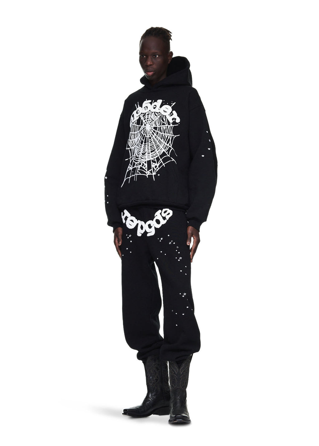 Black OG Web Sweatpant with white puff/discharge print, spiderweb graphic, and scattered stars.
