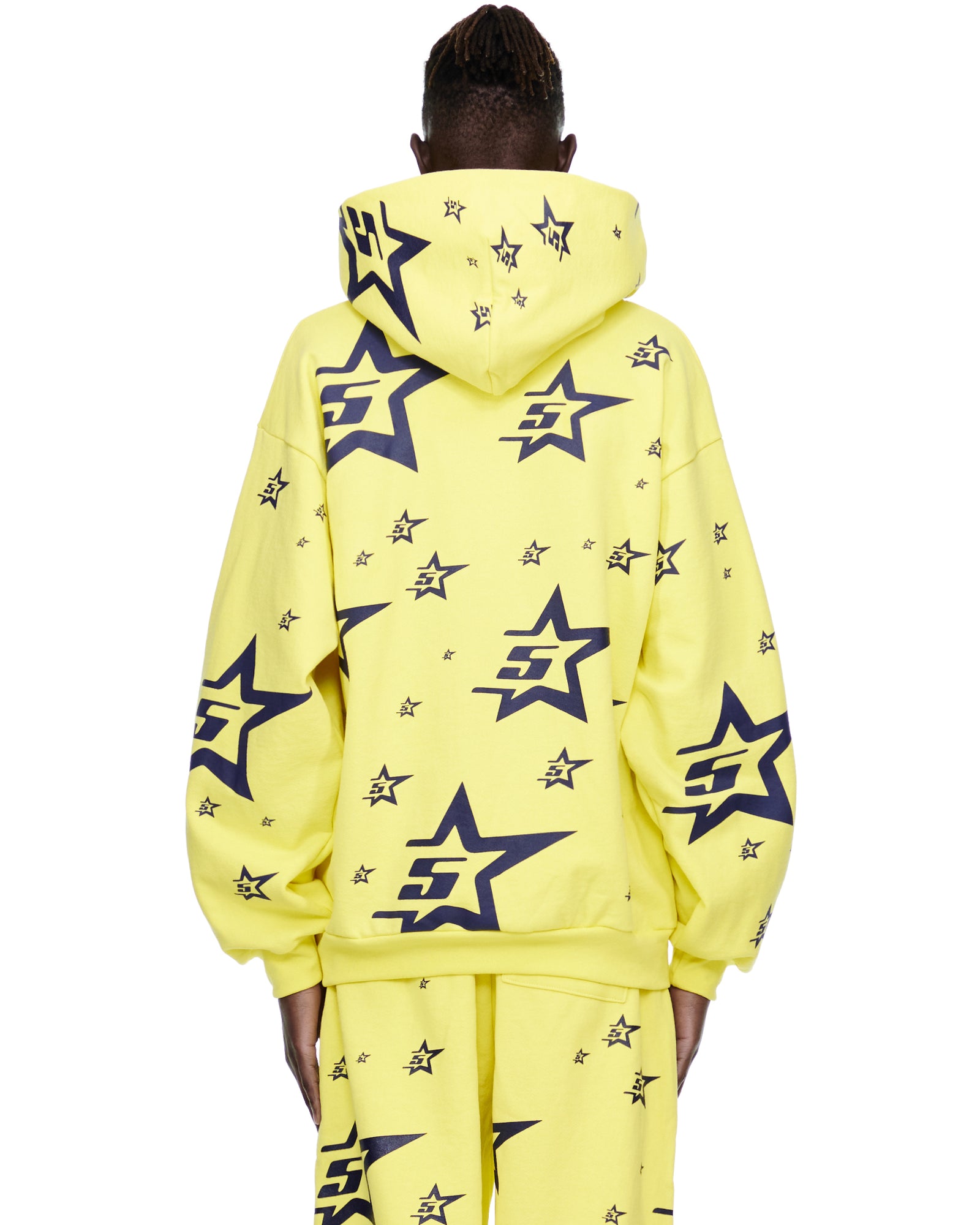 Yellow 5STAR HOODIE with all-over navy screen-printed star pattern, shown from the back.