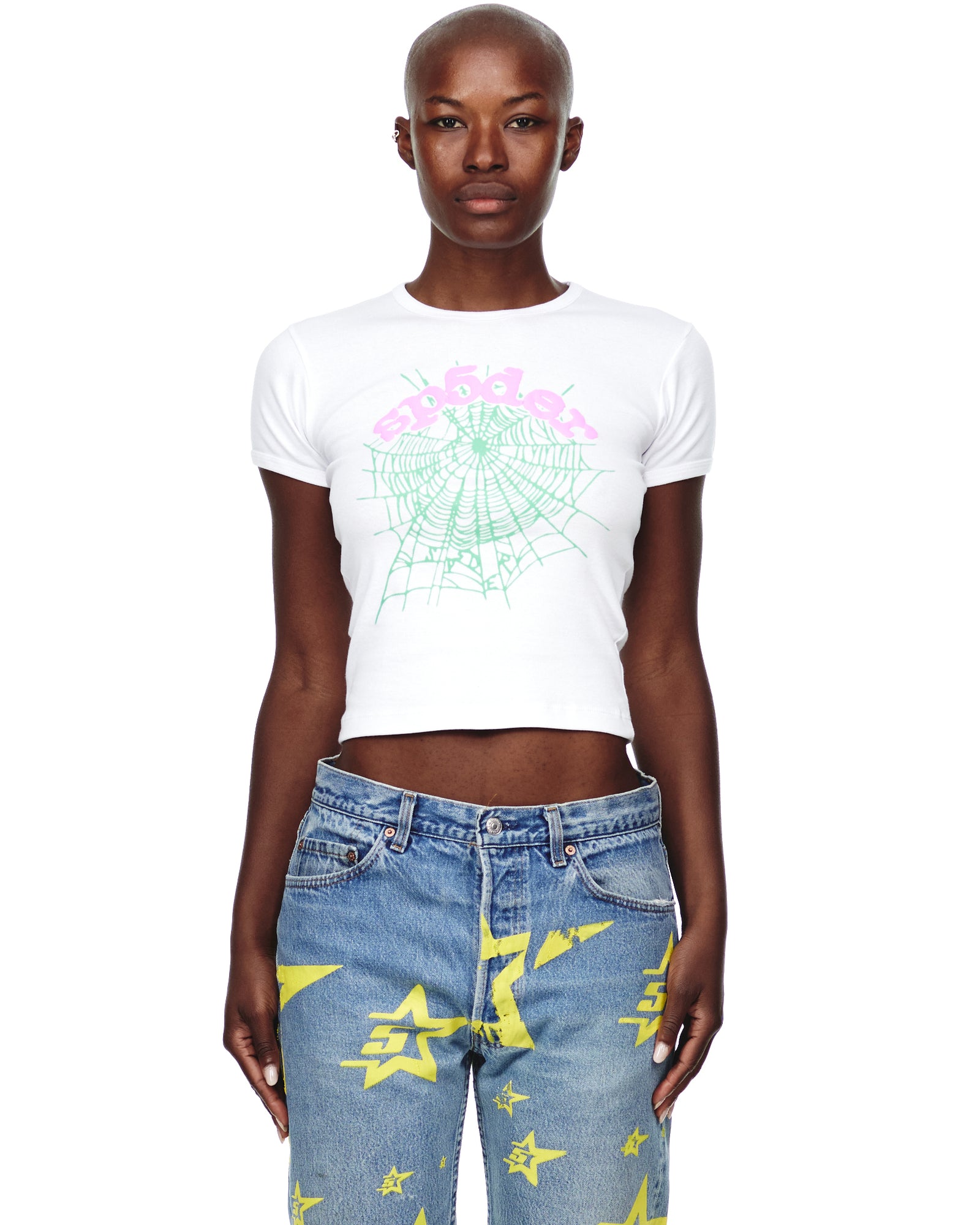 Female model wears white 100% cotton OG WEB CANDY BABY TEE with pink graphic print and green spiderweb.