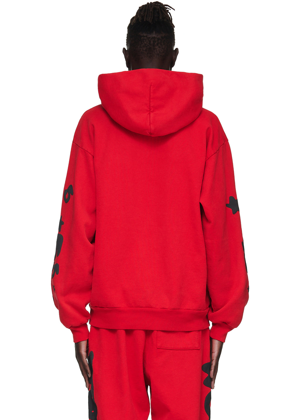 Red Beluga Hoodie with black puff print on sleeves, worn by a model from behind.