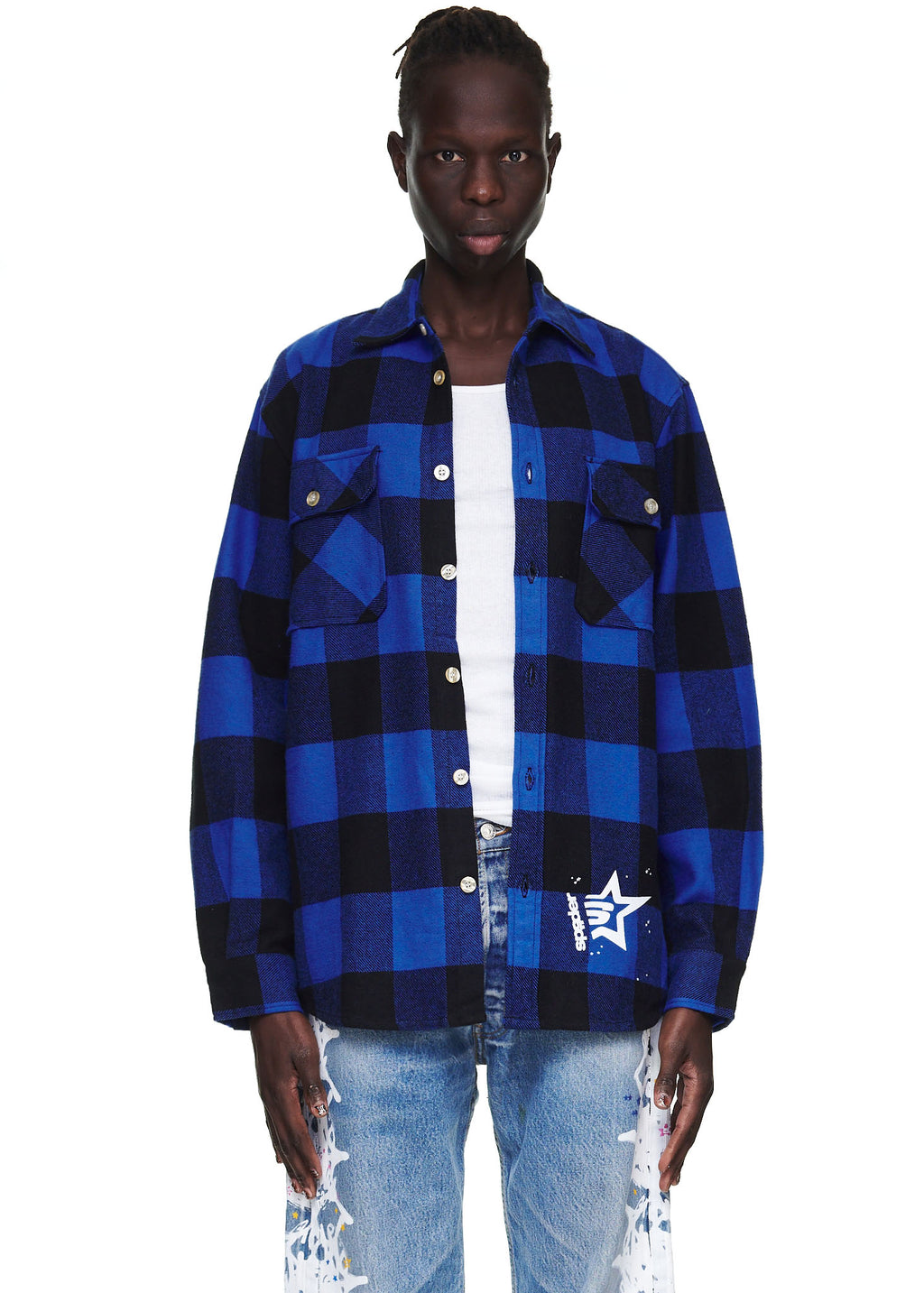 Male model in blue and black plaid flannel shirt with "5" graphic, spread collar, and chest pockets.
