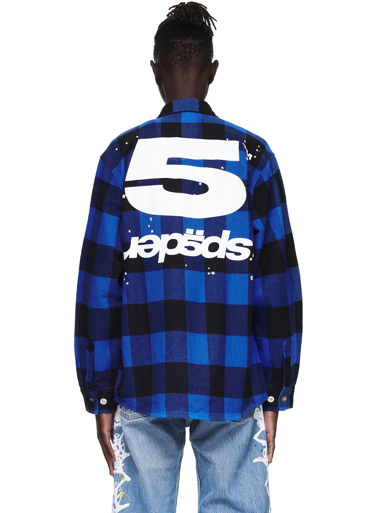 Back of a male model wearing a blue and black plaid flannel shirt with a large white "5" and upside-down text graphic.