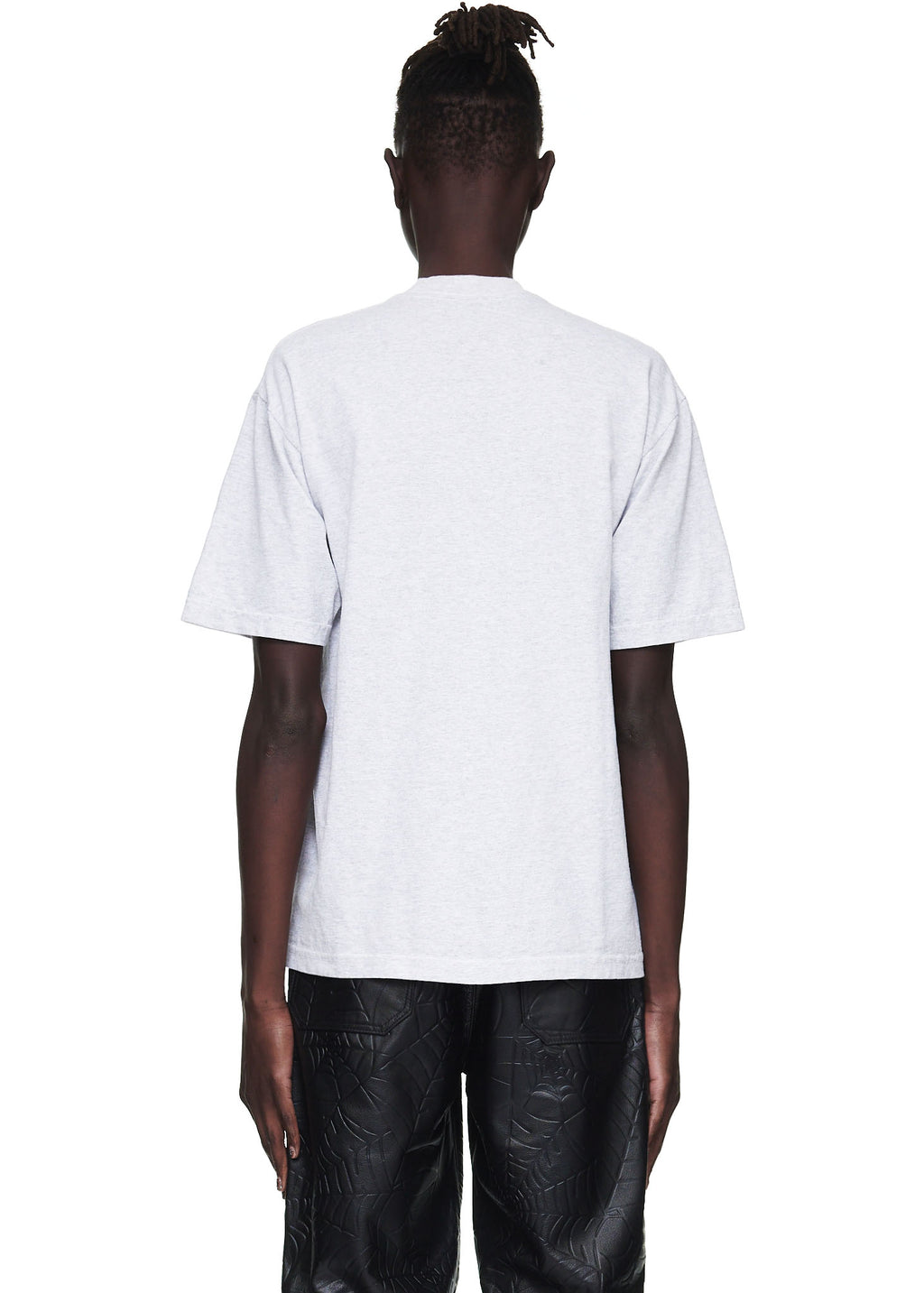 Back view of a male model wearing a standard fit heather grey 100% cotton utility tee.
