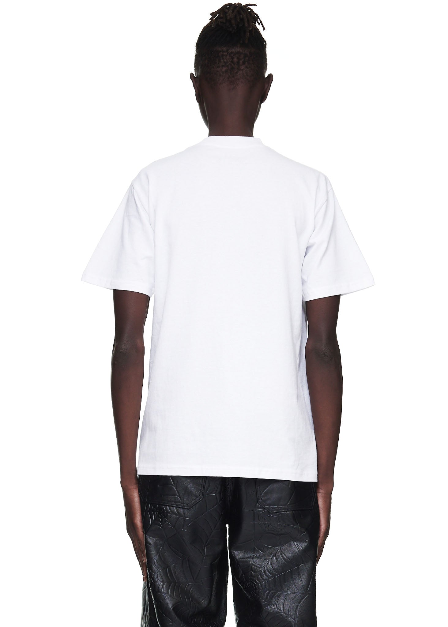 Back view of a male model wearing a white 100% cotton standard fit tee.