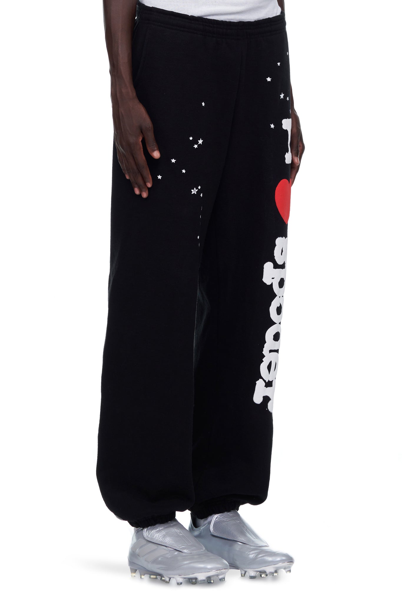 Black fleece sweatpants with white star print and "I heart Teapots" graphic.