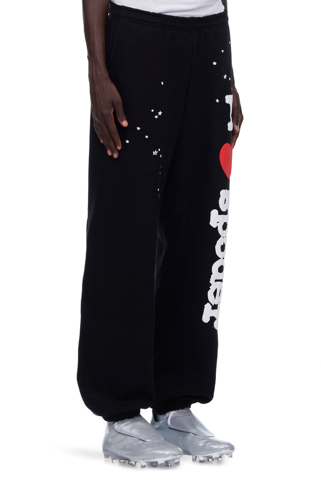 Black fleece sweatpants with white star print and "I heart Teapots" graphic.