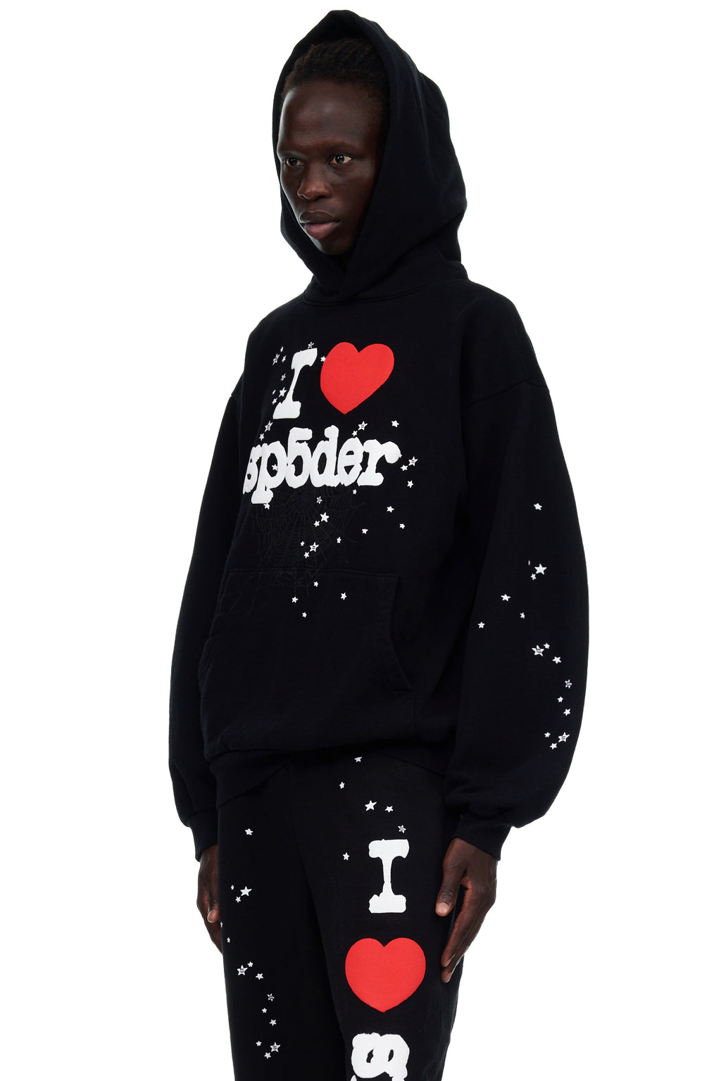 Black fleece hoodie with "I HEART SP5DER" puff print and star discharge print.