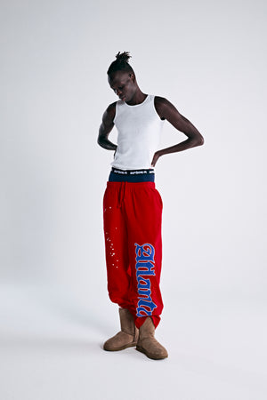 ATLANTA OPEN LEG SWEATPANT RED ON MODEL