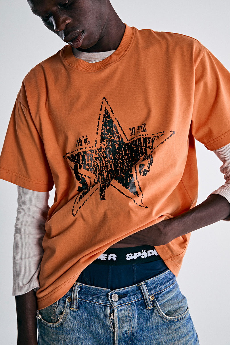 RED ORANGE BIG STAR TEE ON MODEL