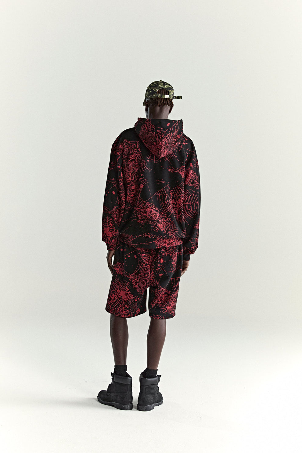 BLACK AOP WEB ZIP UP V2 HOODIE ON MODEL