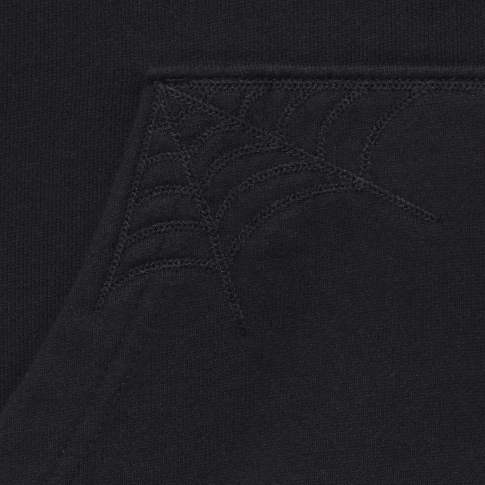 Black 13oz cotton fleece zip hoodie featuring detailed tonal web embroidery on the pocket corner.