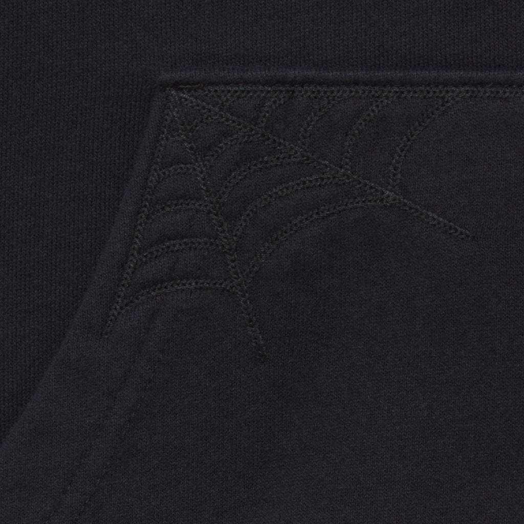 Black 13oz cotton fleece zip hoodie featuring detailed tonal web embroidery on the pocket corner.