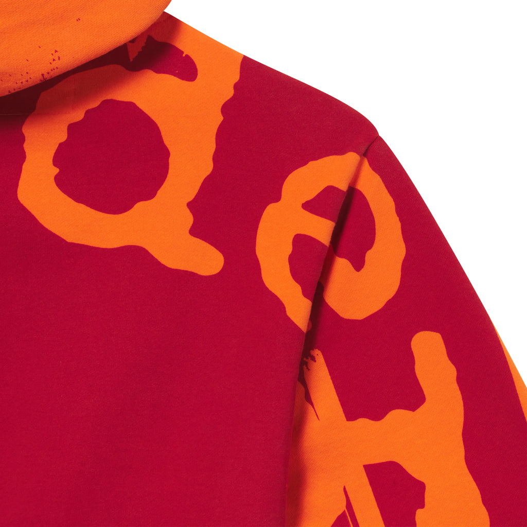 Red 13oz cotton fleece zip hoodie featuring a bold orange graphic text print extending across the shoulder and sleeve.