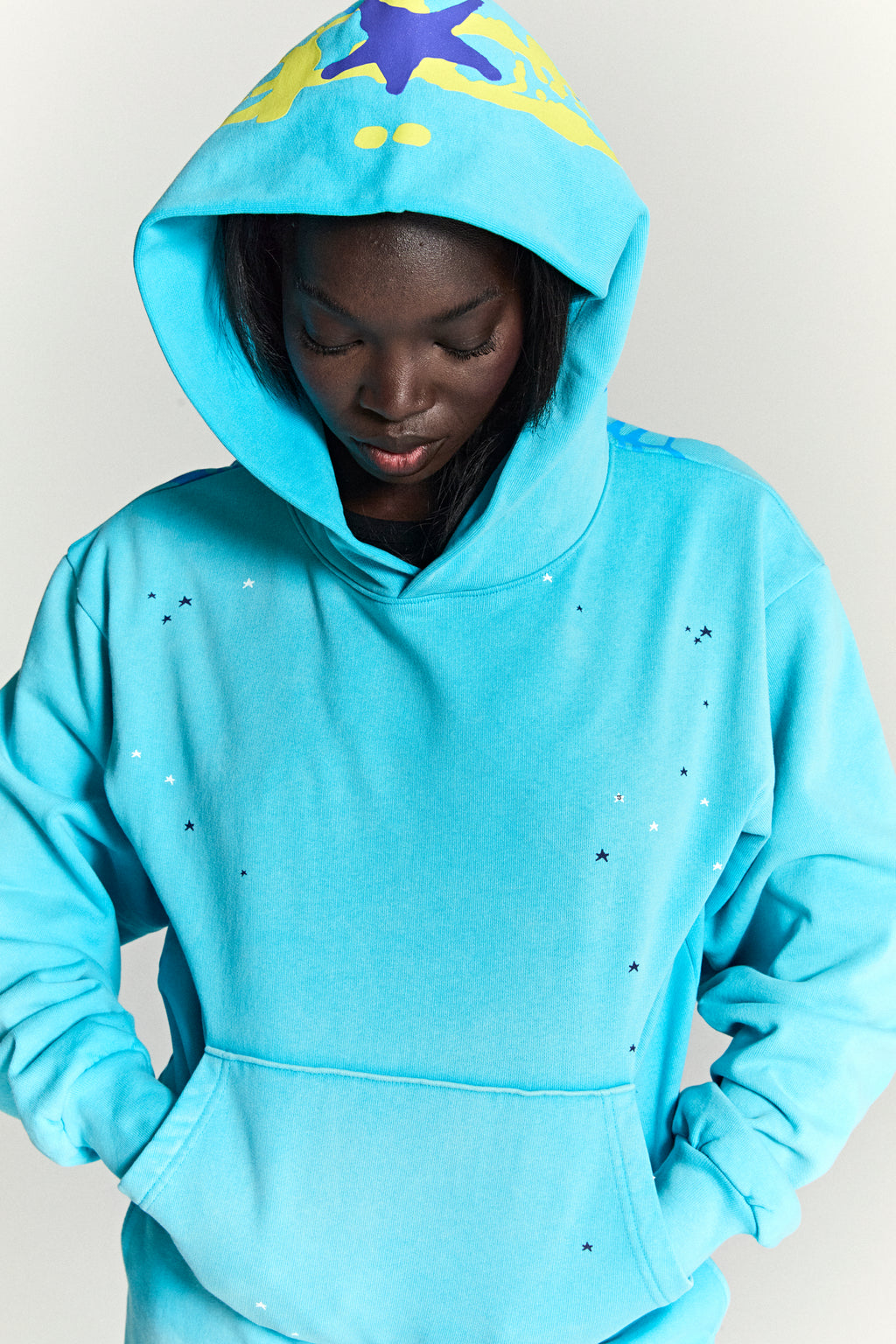 Heavy Web Hoodie: Blue 13oz cotton fleece with scattered star print and web print hood.